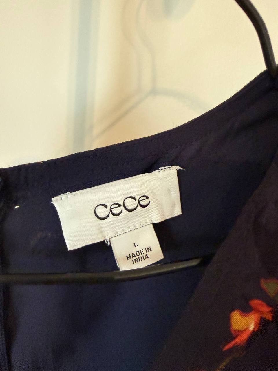 CeCe V‑Neck Smocked Flutter‑Sleeve Romper Navy Floral SIZE L NWT MSRP$79