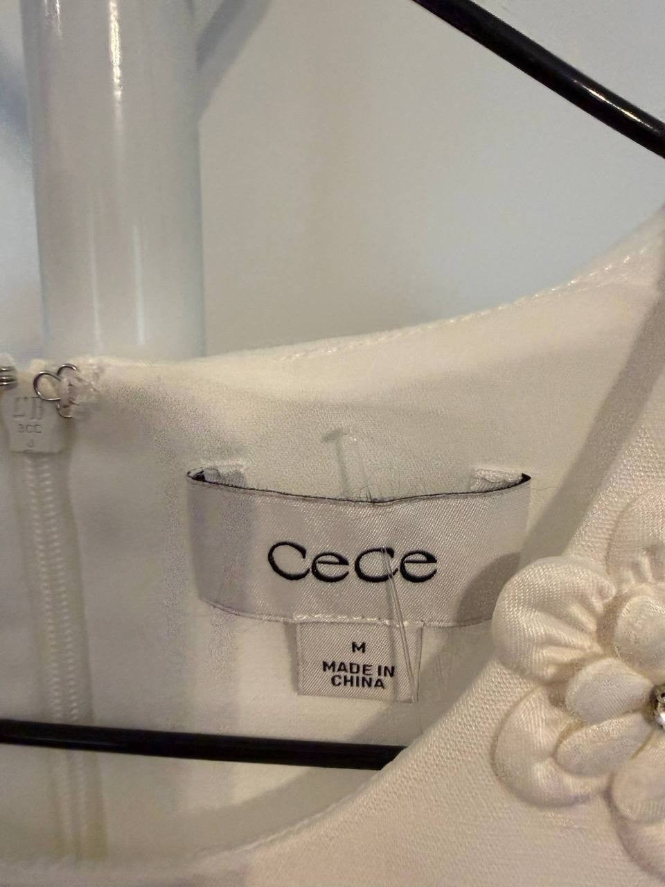 CeCe Sleeveless Ruffled‑Hem Sheath Dress White Size M NWOT MSRP$119