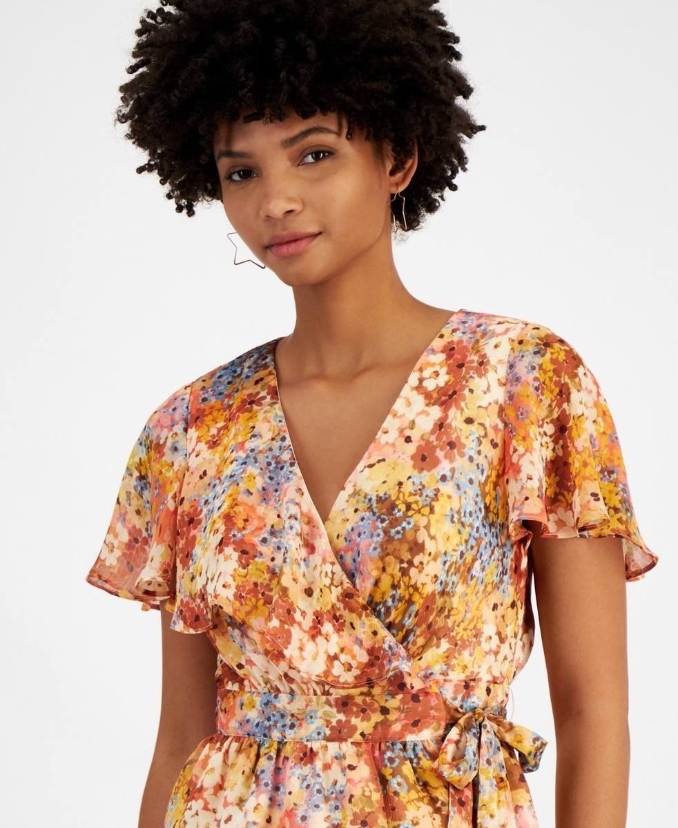 GUESS Women’s Ferra Wrap Top Daisy Peplum SizeL NWT(damaged on the shoulder)mult