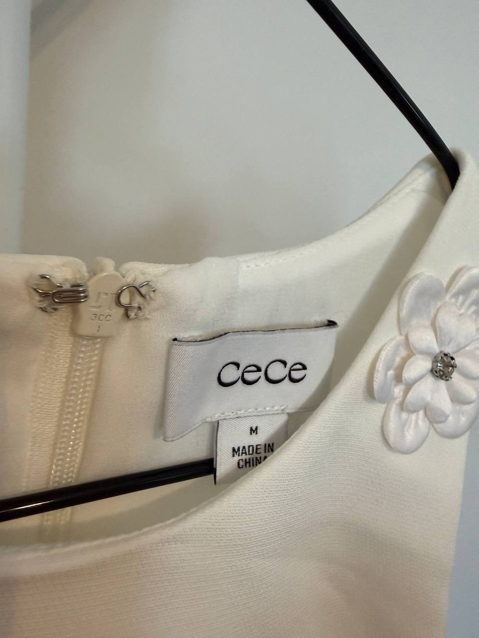 CeCe Sleeveless Ruffled‑Hem Sheath Dress – Size M – NWT – White – $119